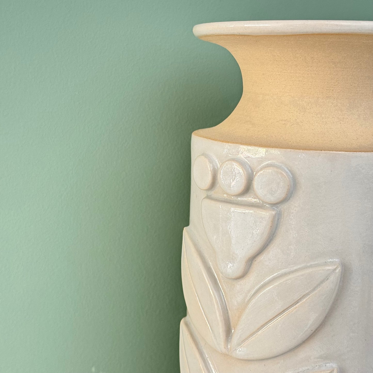 Vase, relief flowers grey