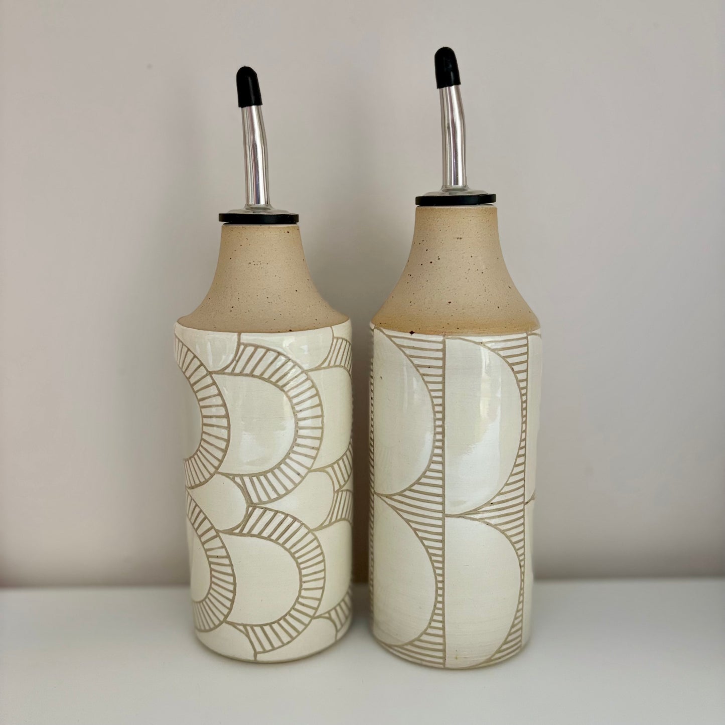 Oil bottle, white half circles