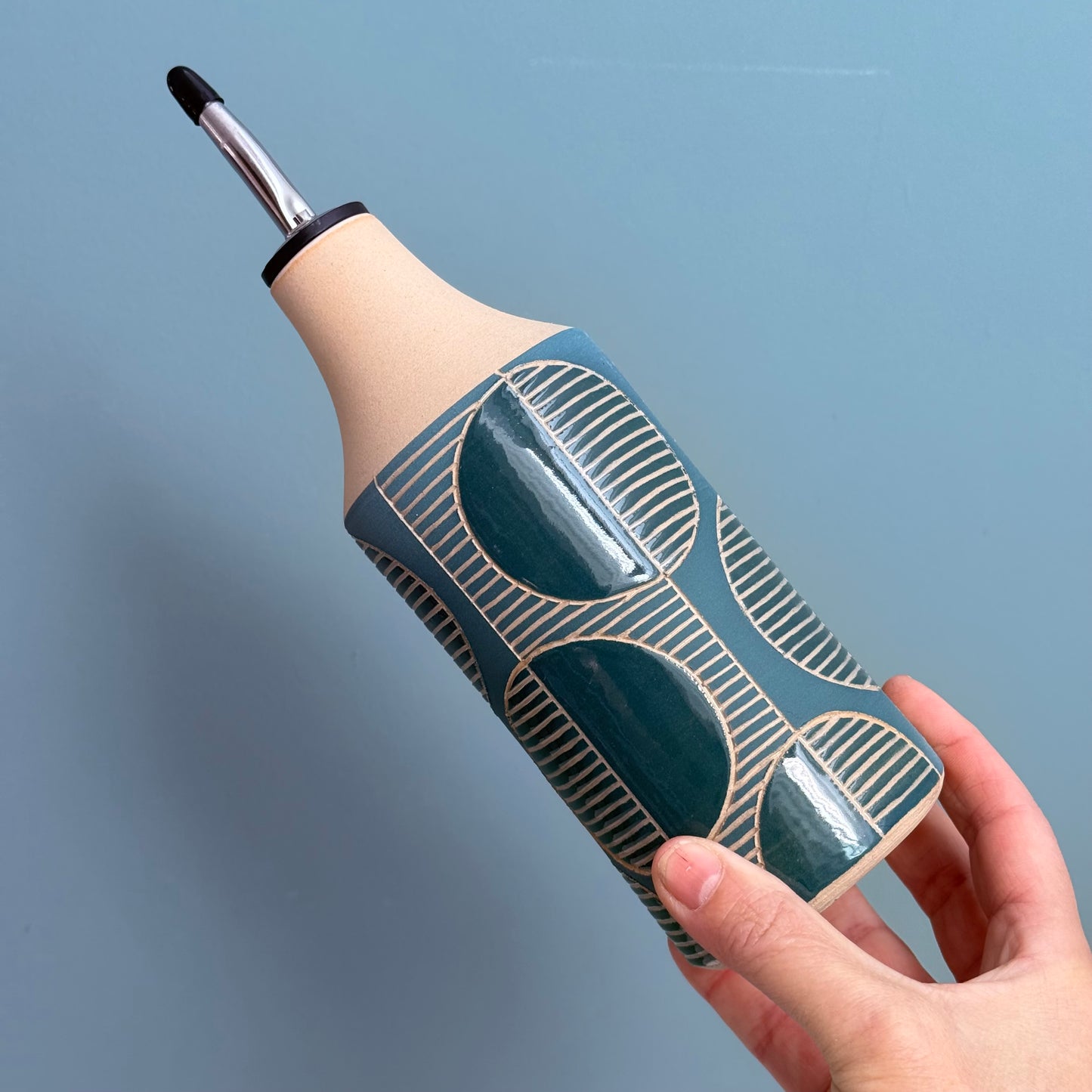 Oil bottle, circles teal