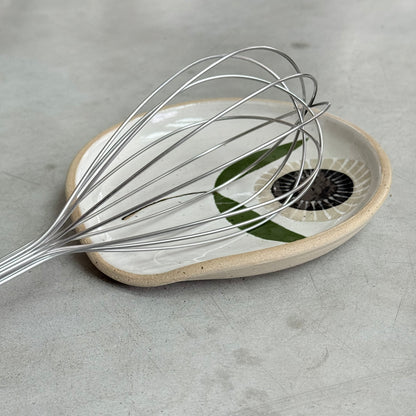 Spoon rest, black radial flower