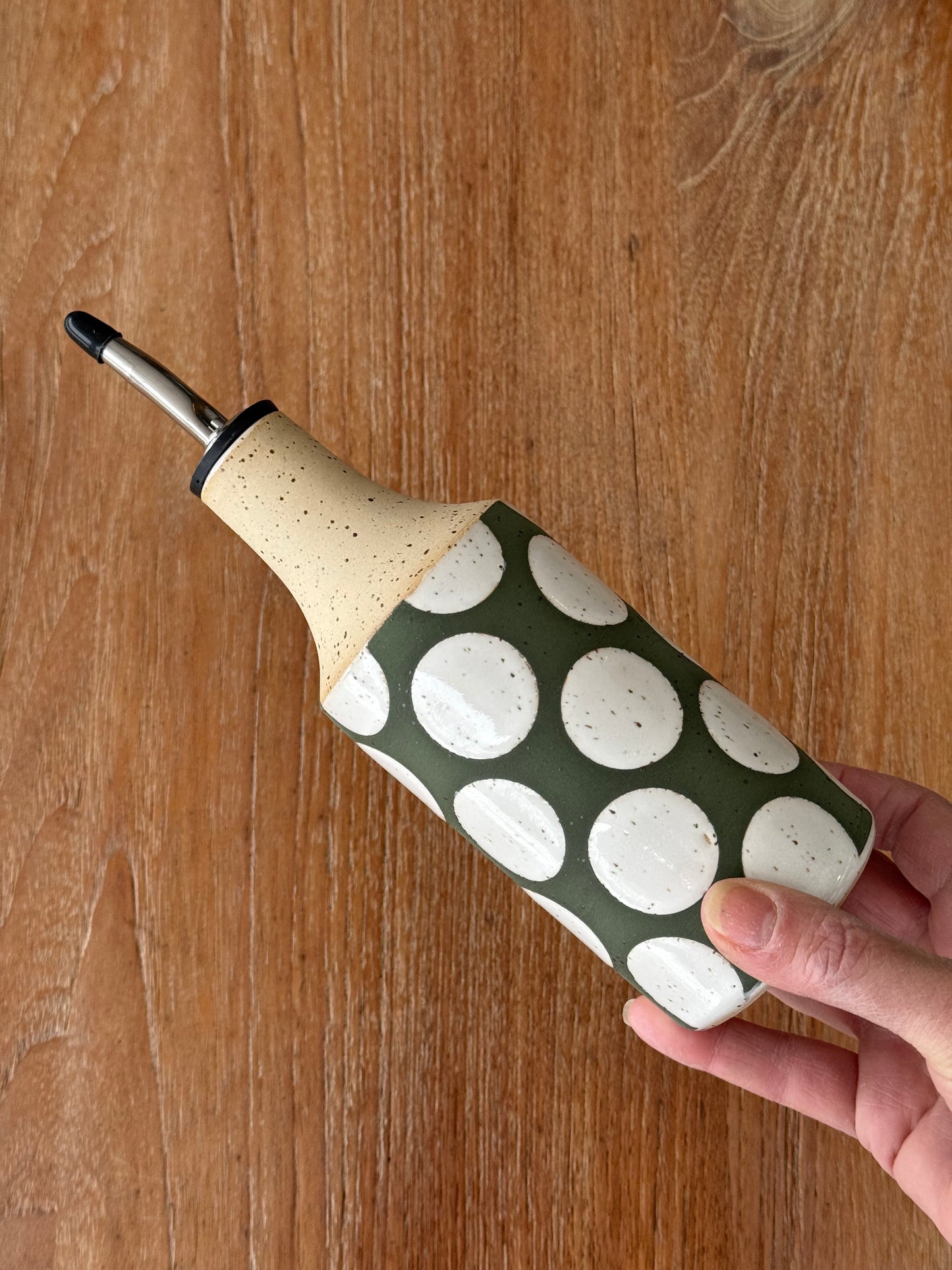 Oil bottle, green/ white dots