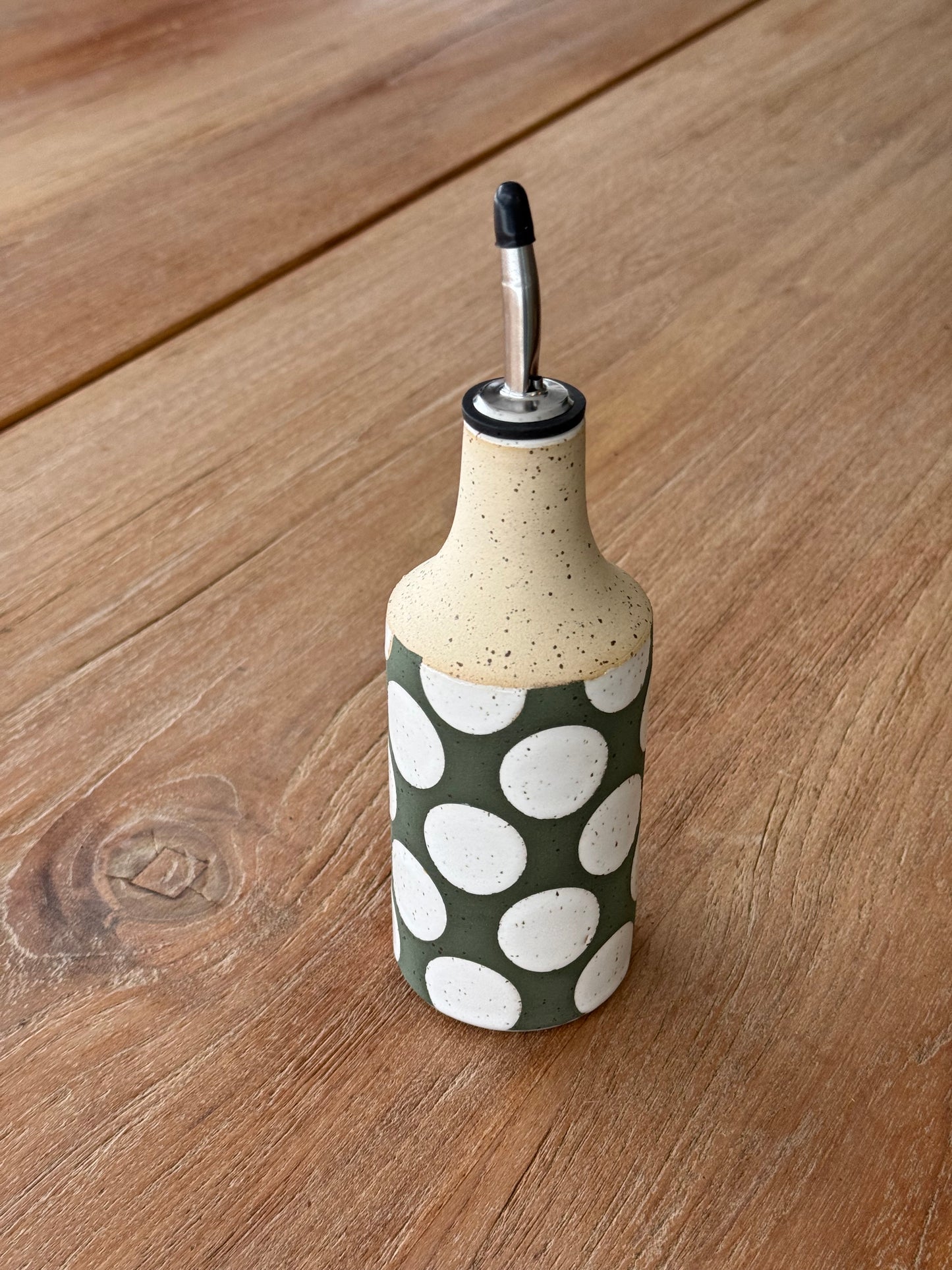 Oil bottle, green/ white dots