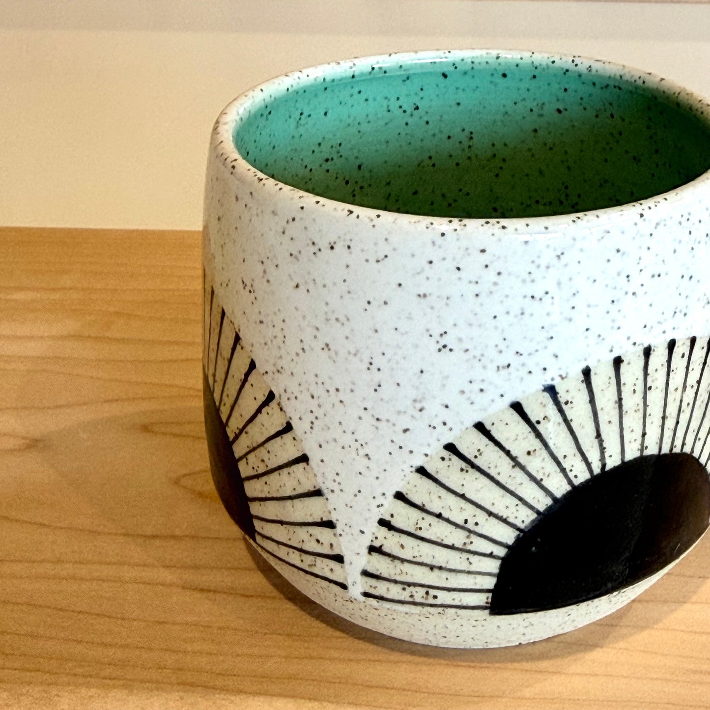 Mug, black sun