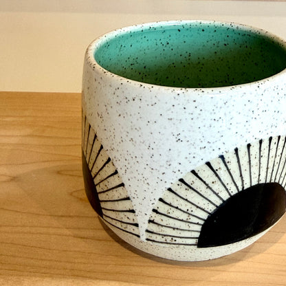 Mug, black sun