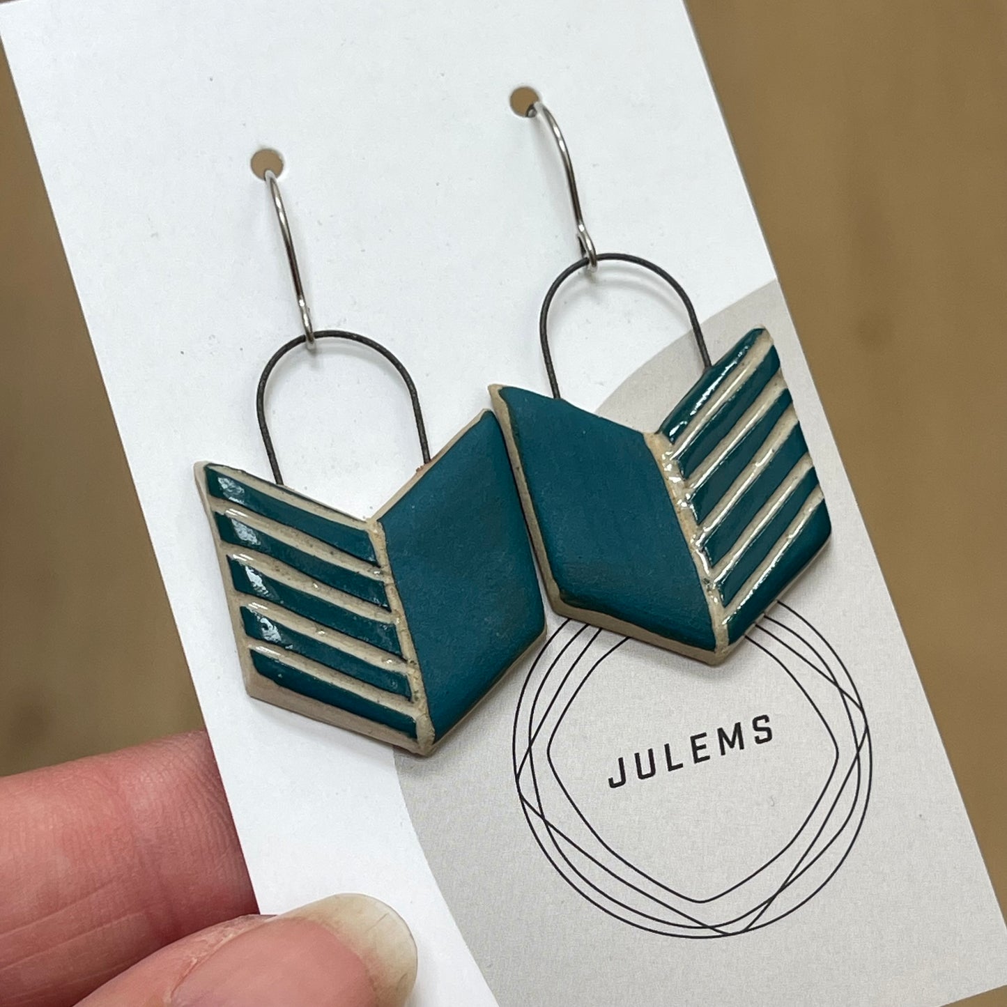 Earrings, bluegreen arrows