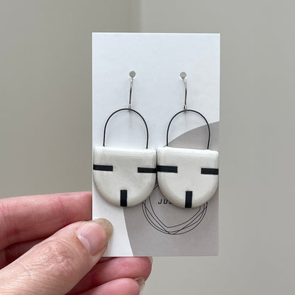 Earrings, solid black lines