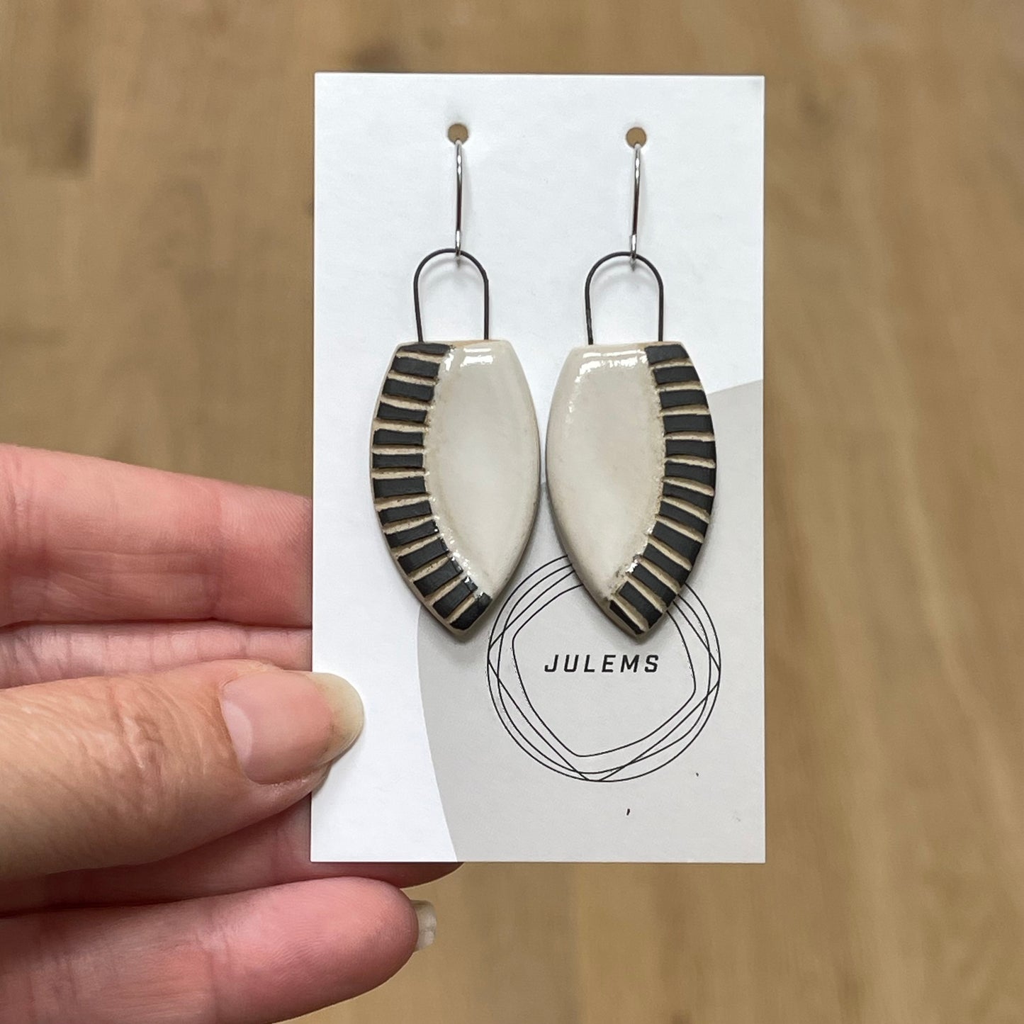 Earrings, carved lines