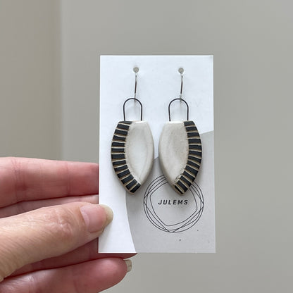 Earrings, carved lines