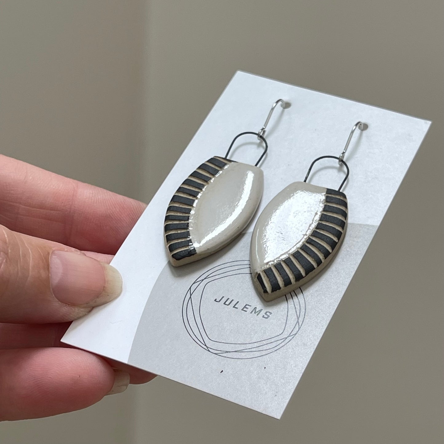 Earrings, carved lines