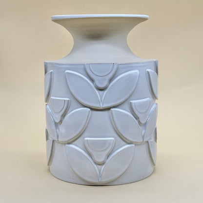 Vase, relief flowers white