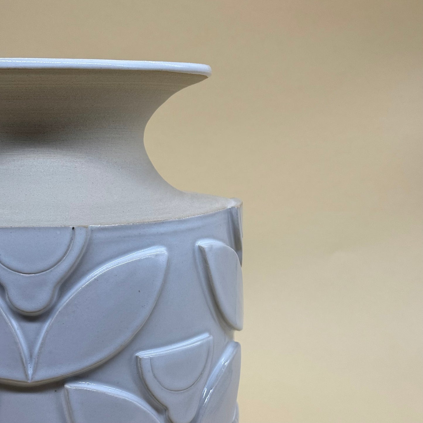 Vase, relief flowers white