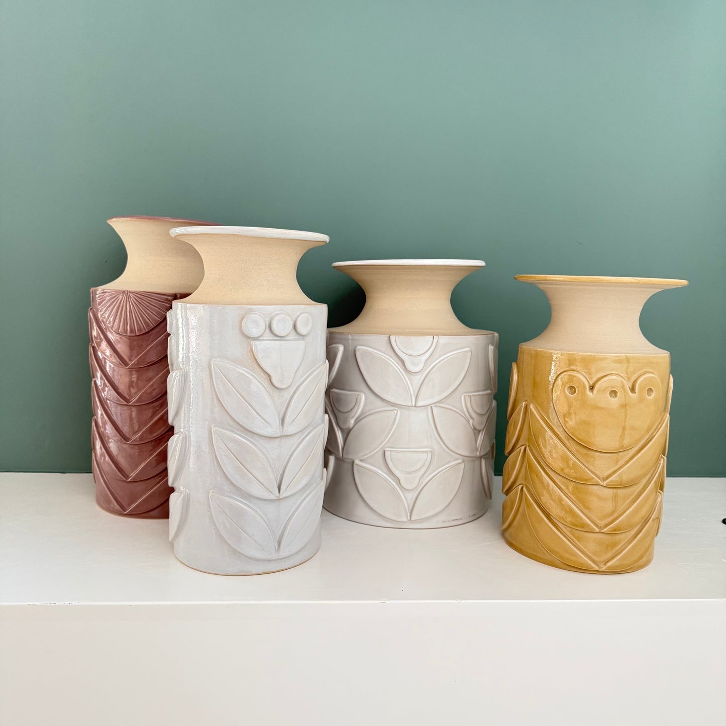 Vase, relief flowers grey