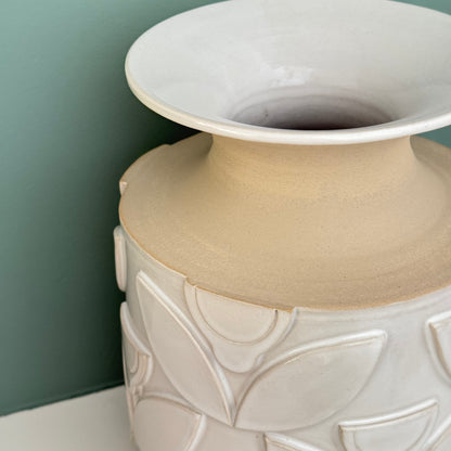 Vase, relief flowers white