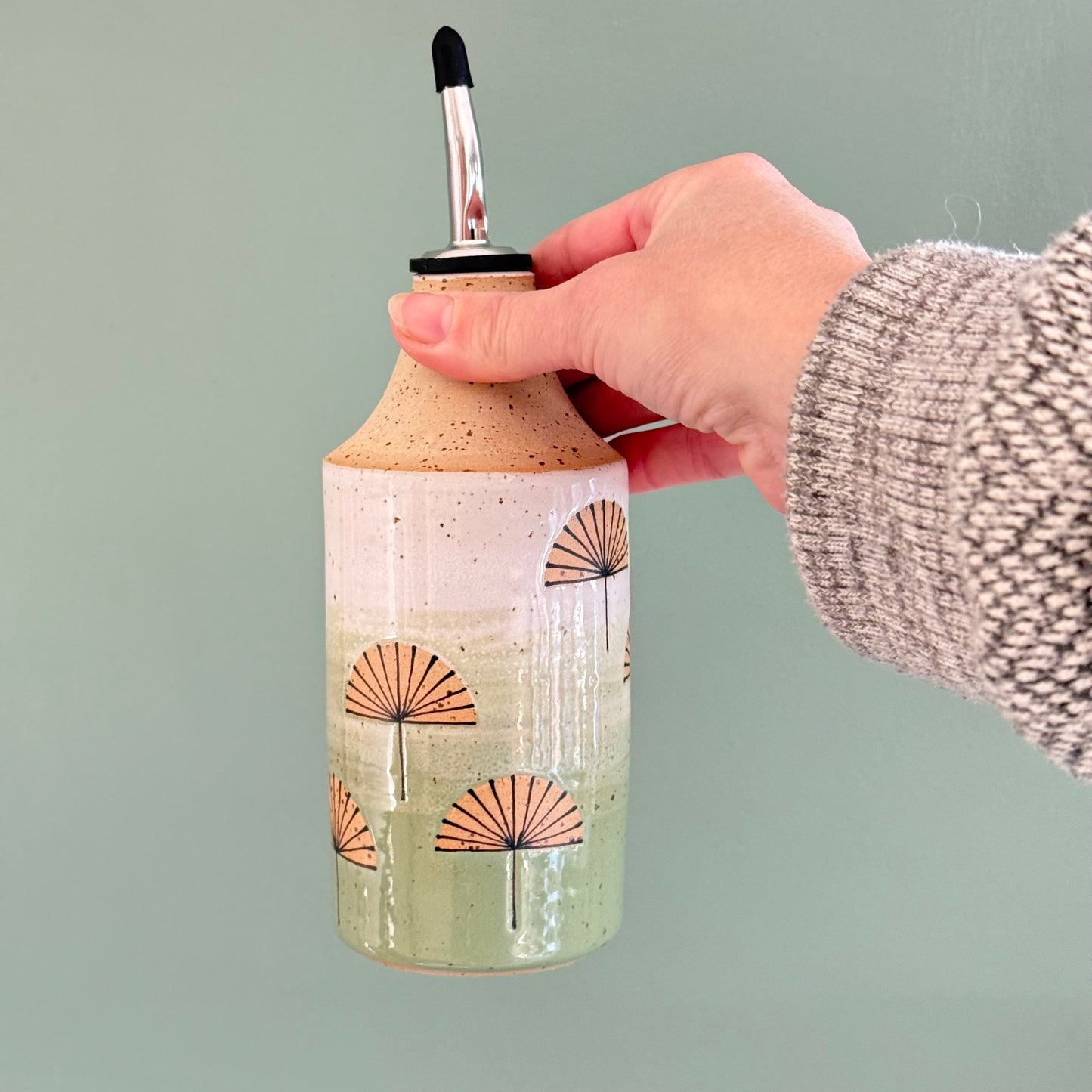 Oil bottle, dandelions