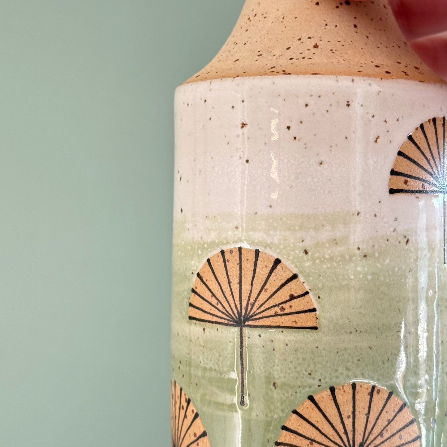 Oil bottle, dandelions