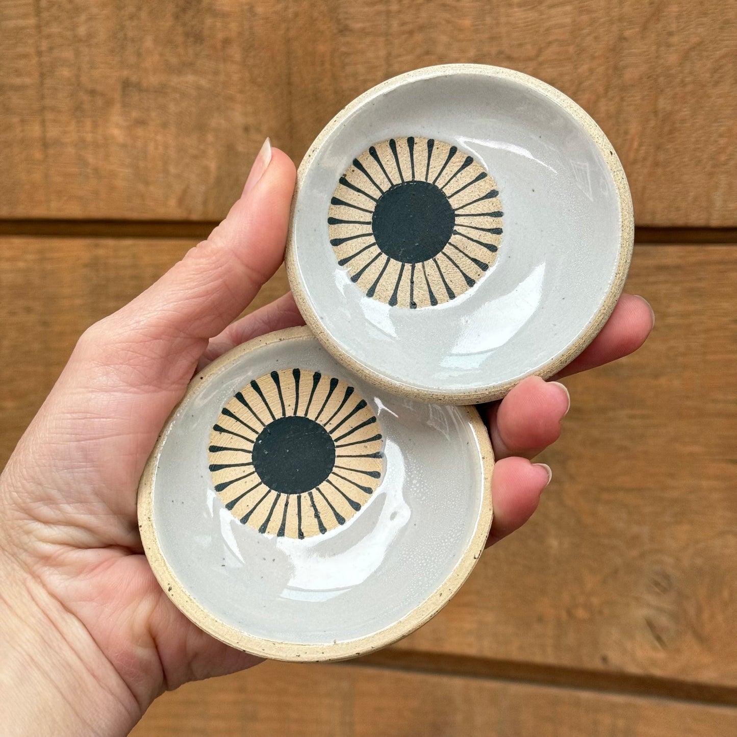 Set of 2 small dishes, black sun/ grey glaze