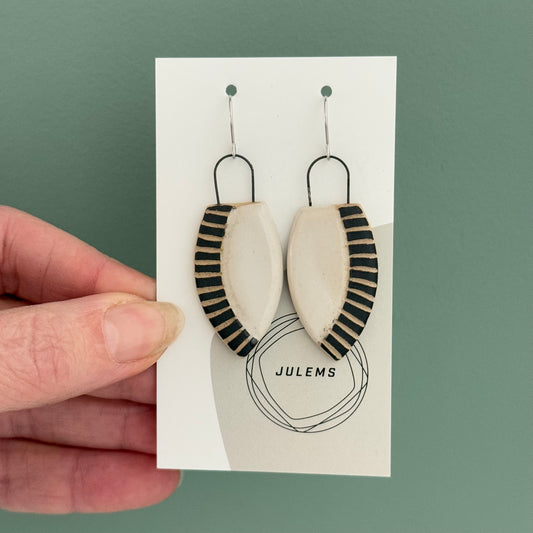 Earrings, carved lines