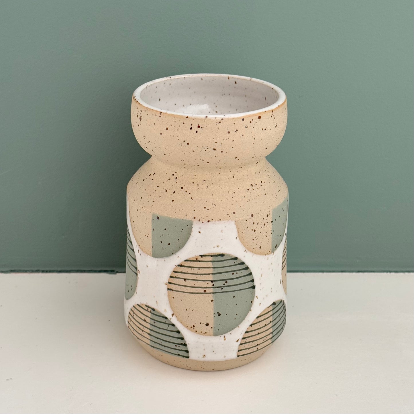 Vase, green striped dots