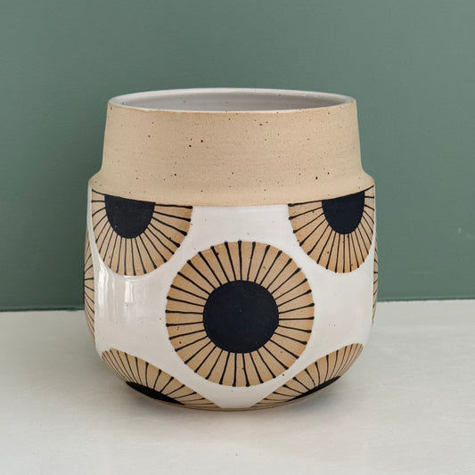 Vase, black sun