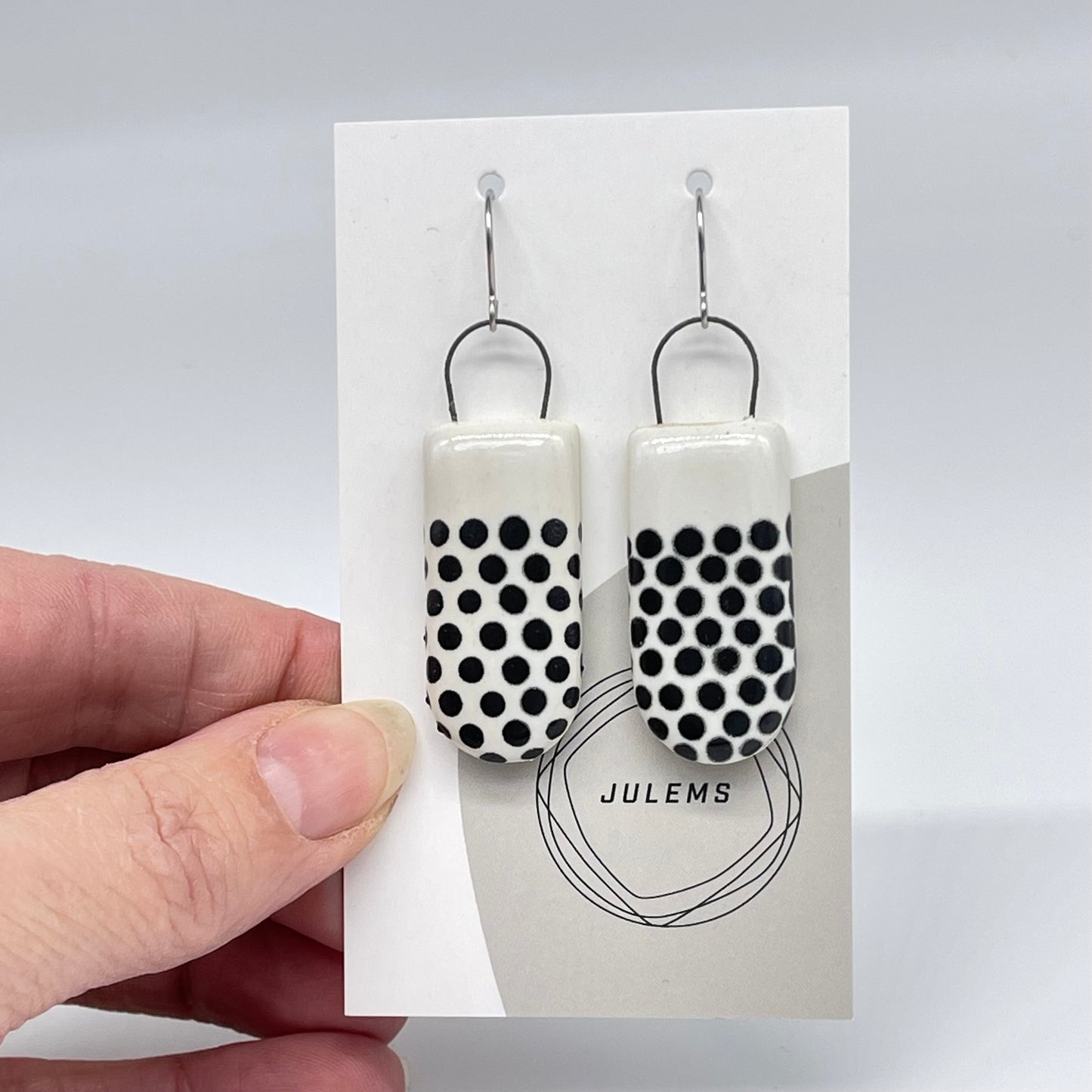 Earrings, black dots