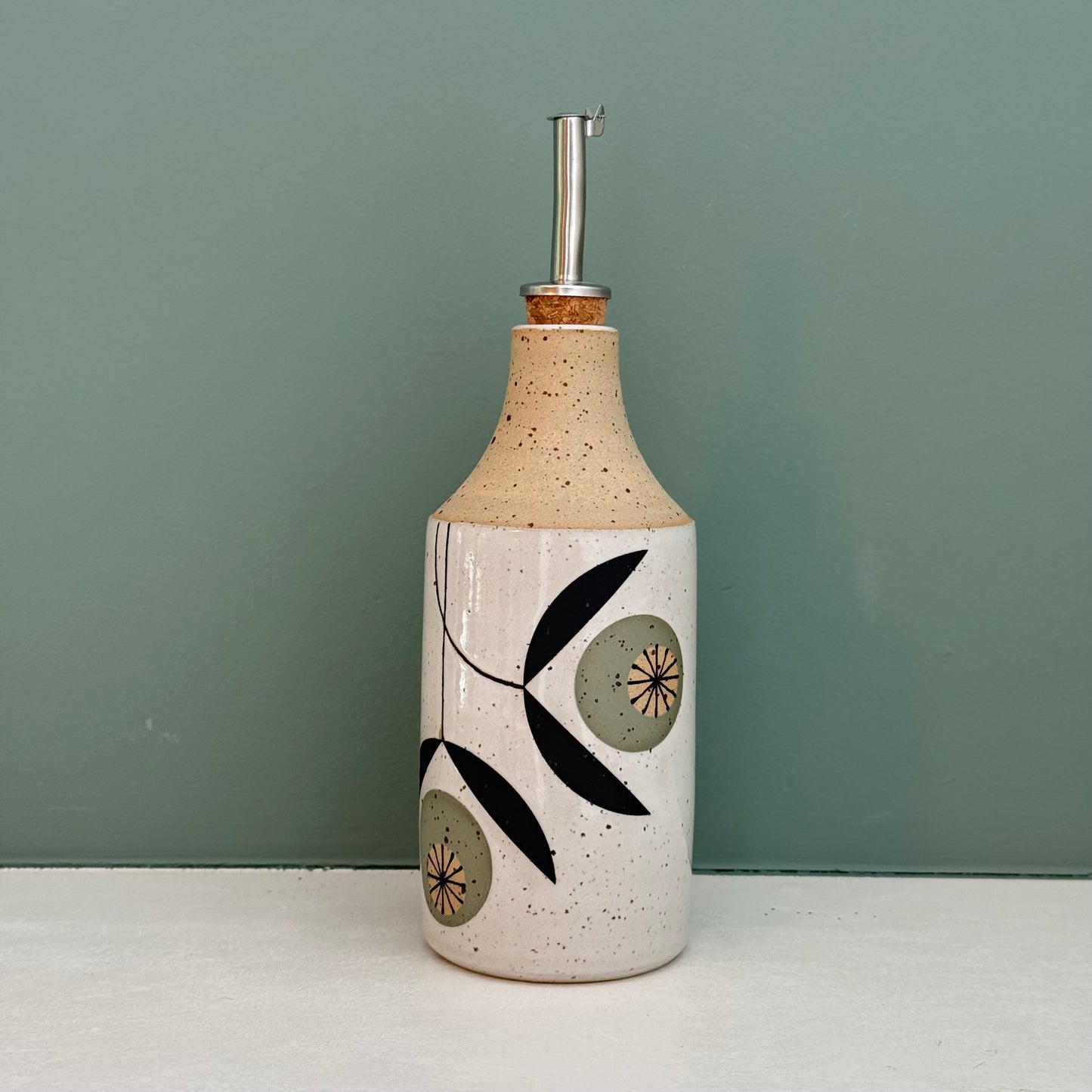 Oil bottle, green flowers